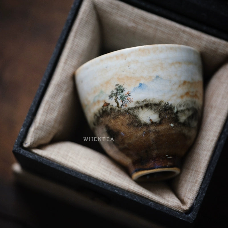 Tasse à thé avec motif de nuages ​​brûlés par le feu